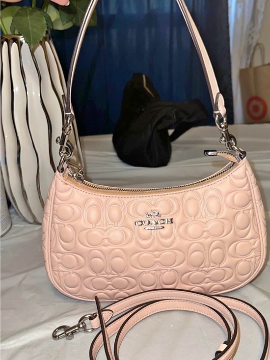 Coach Handbags - Coach Pebbled Signature Small Shoulder Bag in Pale Pink used
